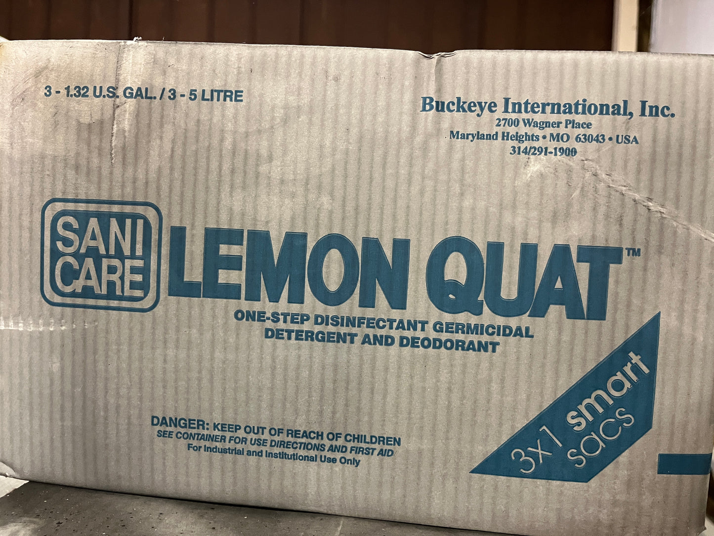 Box of Sanicare Lemon Quat One-Step Disinfectant Germicidal Detergent and Deodorant 3x1 smart sacs.