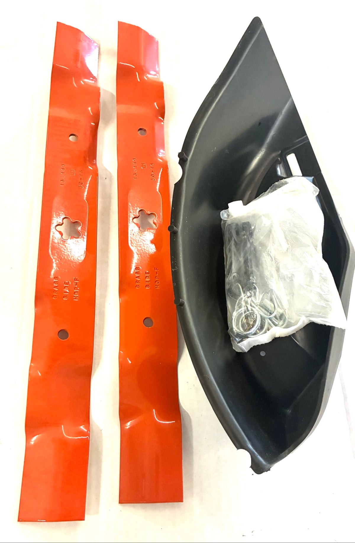 Husqvarna 42 inch tractor mulching kit with two orange 134149 mulching blades, black mulch plug and hardware bag