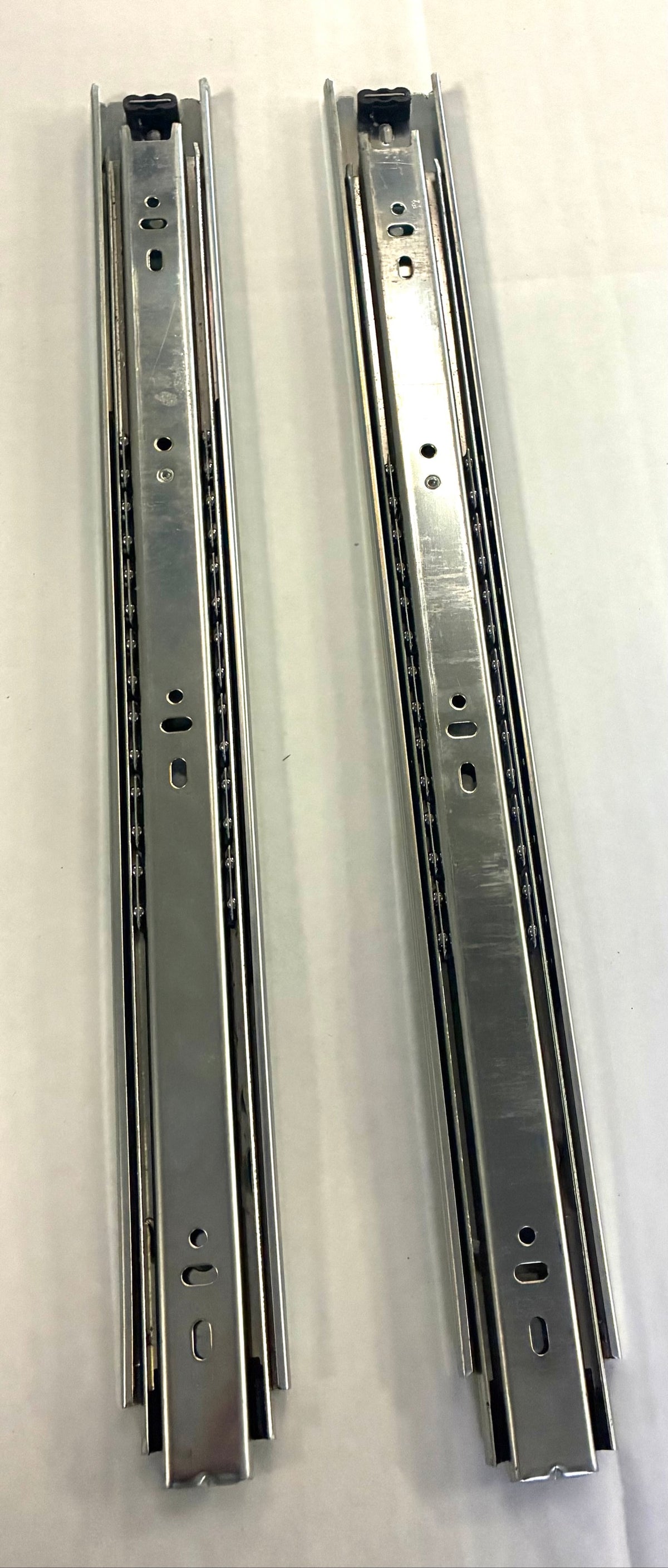 Fulterer FR 5000 drawer slide drawer profile showing steel ball bearing retainers and black disconnect trigger