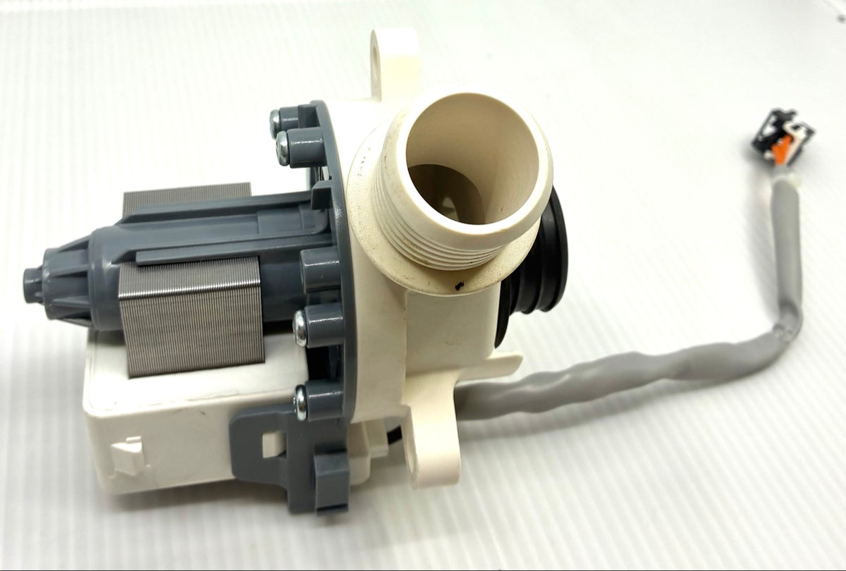 Top angle view of GE washer drain pump showing outlet bore, wiring harness lead and 2-pin connector