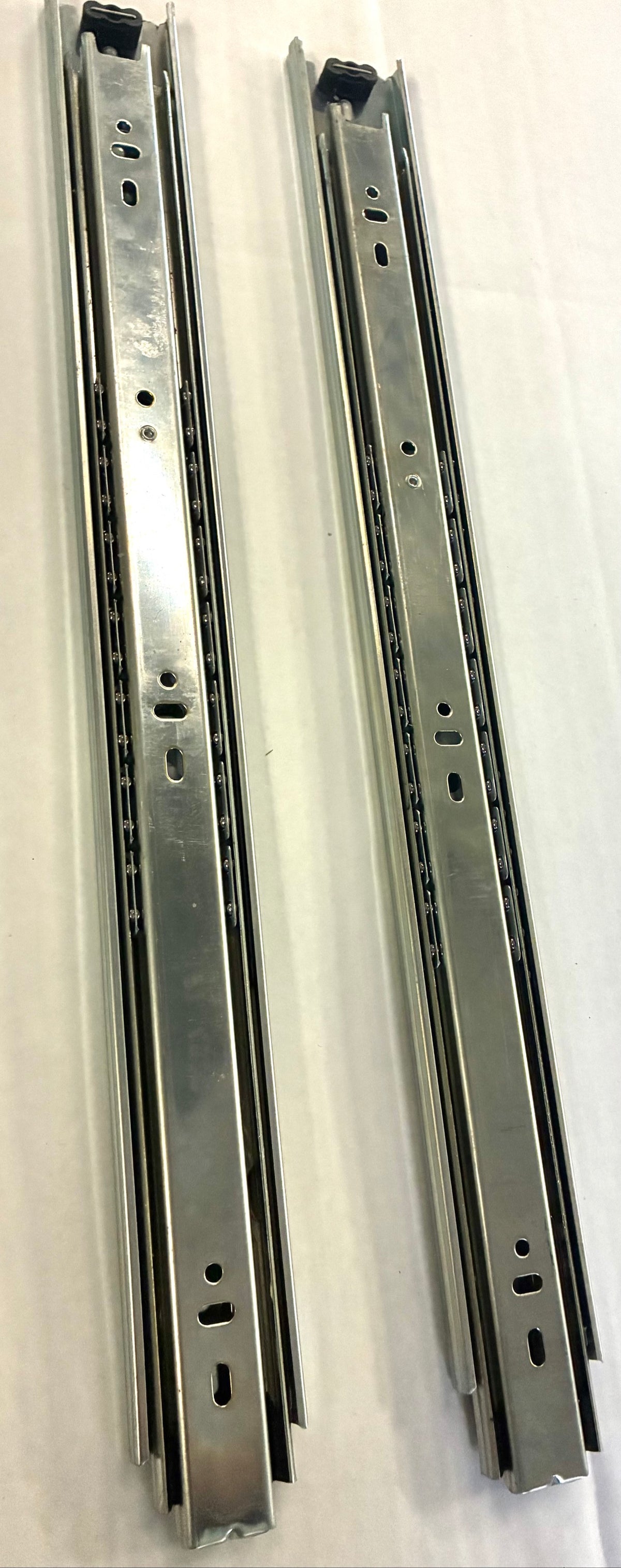 Fulterer FR 5000 ball bearing drawer slides angled side view with disconnect trigger and mounting slots