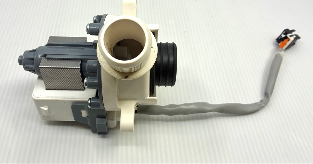 Top view of HANYU drain pump showing outlet port, black rubber inlet grommet and harness lead