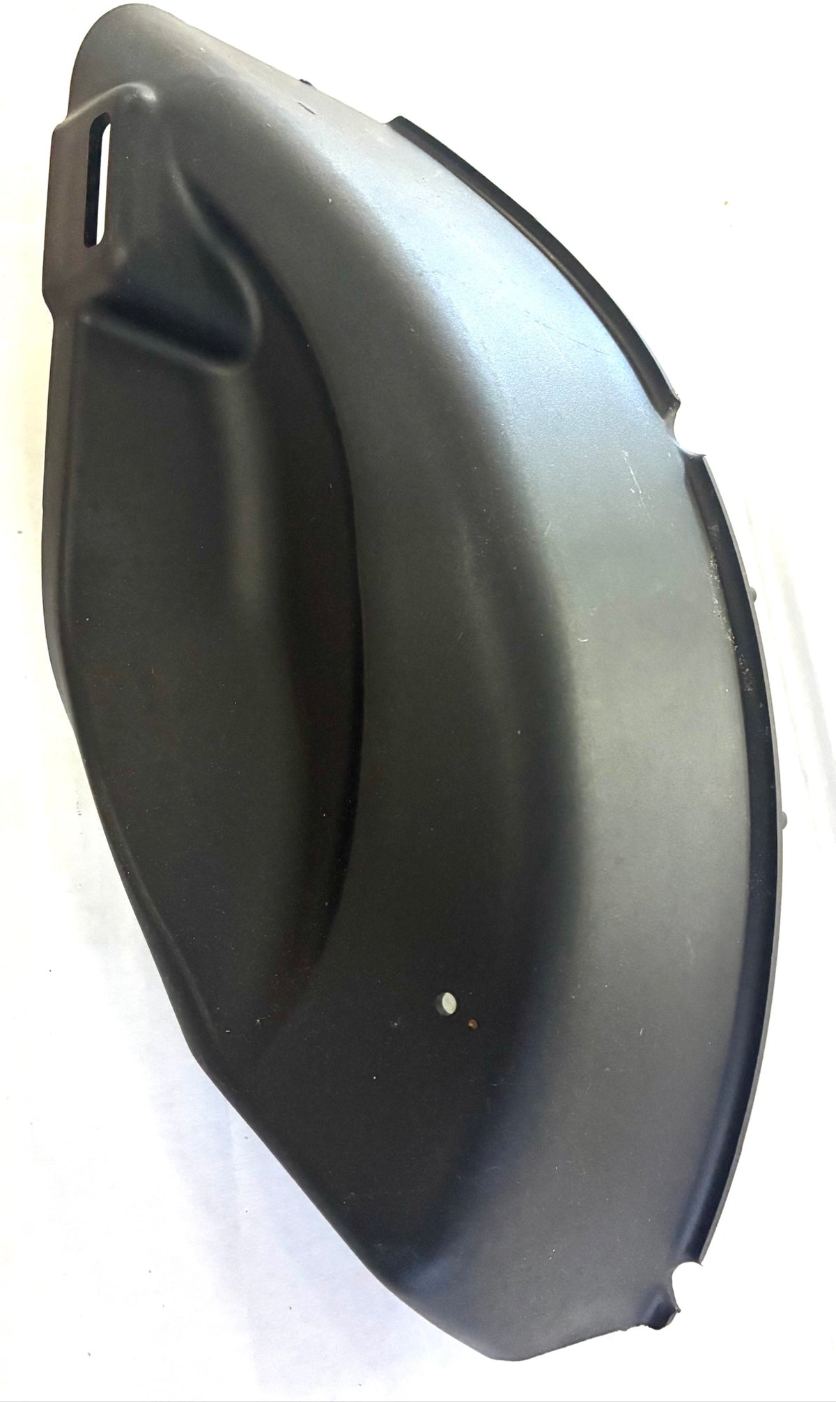 Outside of Husqvarna 42 inch mulch plug cover in black plastic