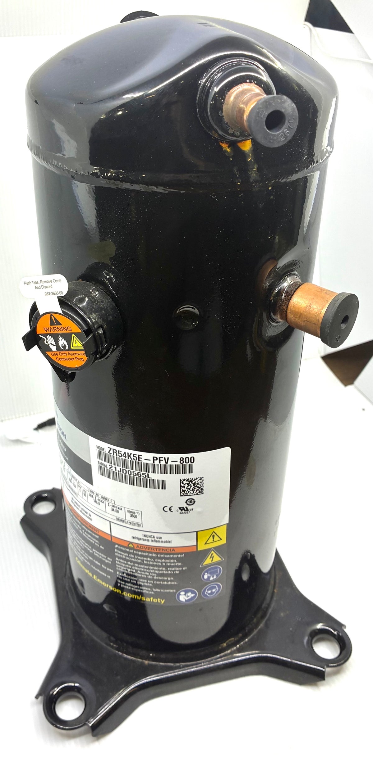 Angled front view of Copeland ZR54K5E-PFV-800 scroll compressor with nameplate and mounting base