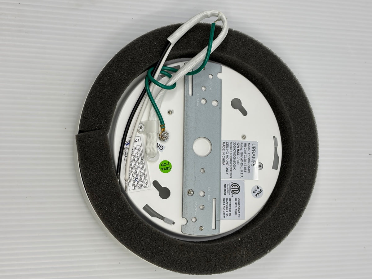 Back of Urban 33 F18807-30-KS LED ceiling light showing wiring, mounting bracket, foam gasket and ETL certification label