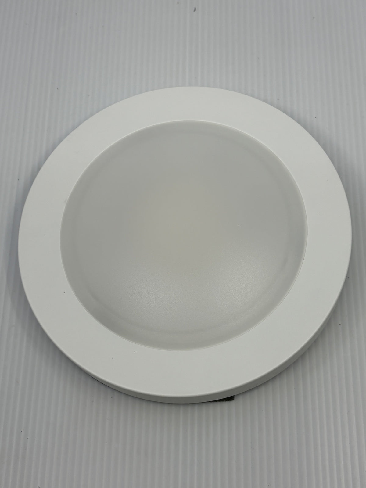 Front view of Urban 33 7.5 inch LED flush mount ceiling light with white acrylic diffuser lens