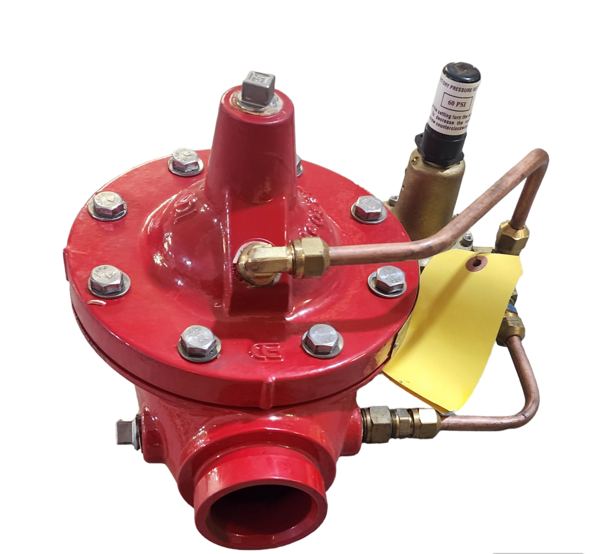 Red pressure gauge with brass connectors and a yellow tag on a white background