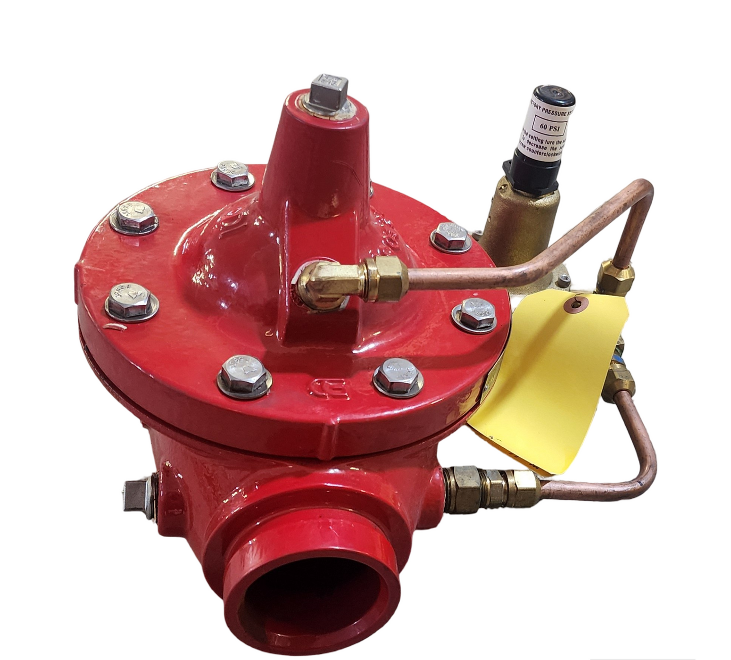 Red valve with brass components and a yellow tag on a white background