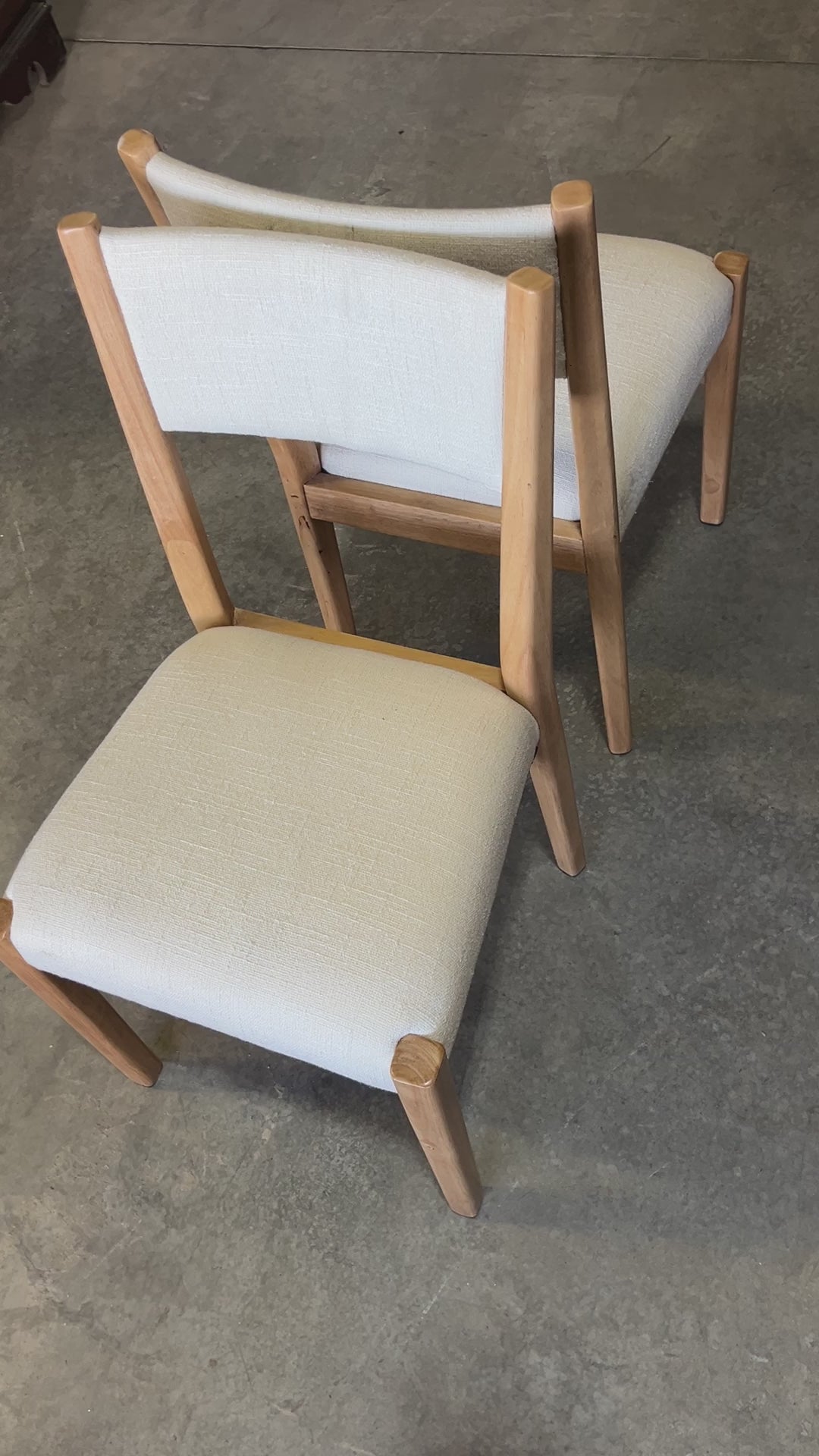 Set of 2 Threshold Studio McGee Yalecrest Dining Chairs in beige upholstery with a sturdy frame. Each chair measures 34 inches in height, 20 inches in length, and 18 inches in width. Elegant and modern design for dining rooms, kitchens, or home offices